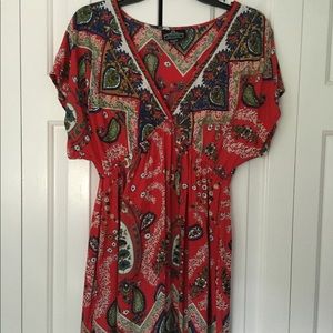 Angie’s red patterned dress